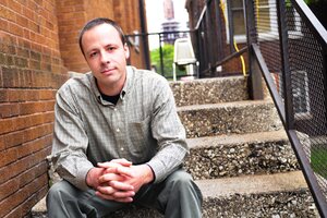 Man sitting on stairs 