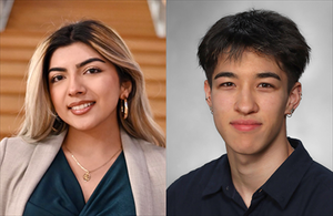 Smiling young woman in business attire on left; smiling young man in dark shirt on right