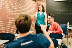 Students and teachers participate in French class