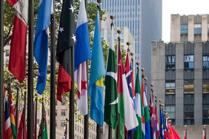 A row of flags from all over the world in the city of New York