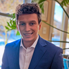 Smiling student in button down and blazer 